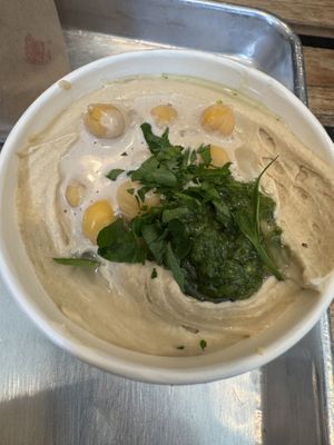 Hummus with tahini and spicy sauce  at Tamam - Upper East Side in New York City