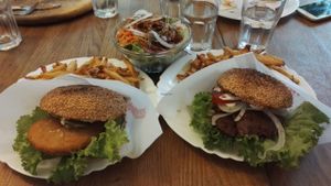 Seitan burger and fish burger with sallad at vego Foodworld in Berlin