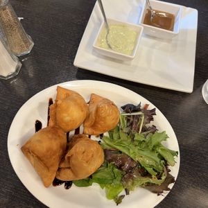 samosas! (only the brown sauce is vegan i think, my non vegan friend had the creamy one)  at Curry & More in San Diego