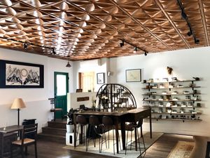 the beautiful indoor space, complete with traditional seating and retail
 at Mountain Gate Teahouse and Art Gallery in Telluride