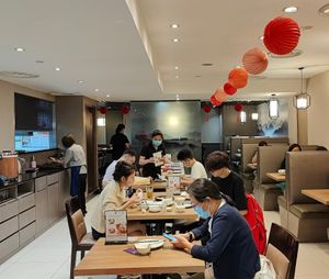 Restaurant interior at Crystal Jade LaMian XiaoLongBao 翡翠拉面小笼包 - Bugis Junction in Central Singapore