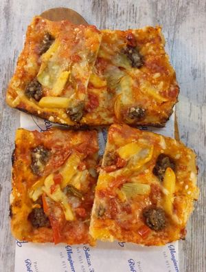 Vegan pizza at Aldo's Bakery in Turin