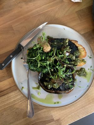 Mushrooms in toast with spinach and vegan sausage  at New Ground in Harlow