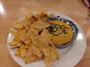 Chips and vegan cheese dip at Seva - Ann Arbor in Ann Arbor
