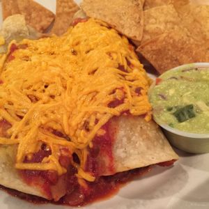 chorizo & pinto enchiladas w Daiya cheddar (vegan) at Seva - Ann Arbor in Ann Arbor