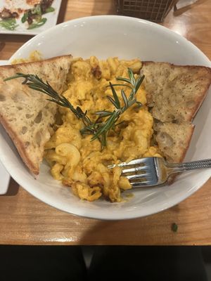 Vegan mac and cheese is also very flavorful and hits the spot! The toasted garlic bread is crunchy, but not rock hard like the ones that cut your gums!  at Seva - Ann Arbor in Ann Arbor