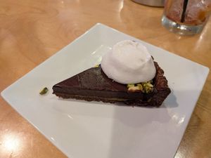 Chocolate pistachio tart (vegan) at Seva - Ann Arbor in Ann Arbor