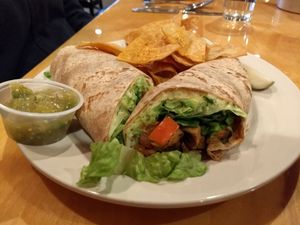 Tlt wrap: tempeh lettuce & tomato with guacamole g vegan cheese. at Seva - Ann Arbor in Ann Arbor