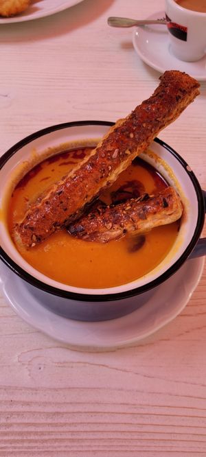 Mango pumpkin cream soup with roasted pumpkin seeds at Schönbrunner Stöckl in Vienna