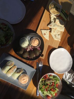 Salad, falafel, hummus, veggie spreads, pita, spring rolls mmm  at Nook in Stari Grad