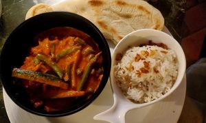 Vegan curry with fresh naan and rice at Nook in Stari Grad