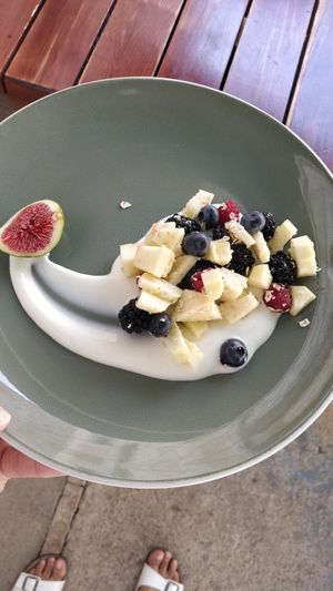 Mixed fruit with Greek yogurt at Nook in Stari Grad