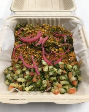 Coconut Curry Bowl to go. Loved it. Served in a compostable container. at Bombay Pizza Kitchen in Plymouth