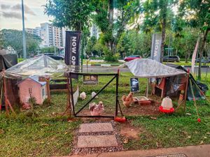 In front of their shop at OsomeFood in Northeast Singapore