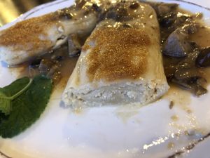 Vegan cheeseroll with breadcrumbs and mushroom sauce  at Hotel Tripič in Radovljica