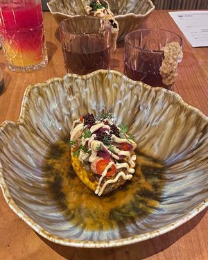 SHROOM-KABOOM: Süsskartoffel, Raps-Kaviar, Tofucrème Pilzessenz, Austerseitlinge. (Juice: Kombu-Eistee)  at ANOAH in Zurich