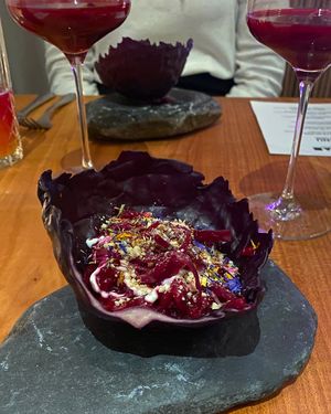 PURPLE RAIN: Getrüffeltes Rotkohlrisotto, Kimchi, Sojajoghurt, karamellisierte Haselnuss. (Juice:~Rote Beete mit Hibiskusblüte~)  at ANOAH in Zurich