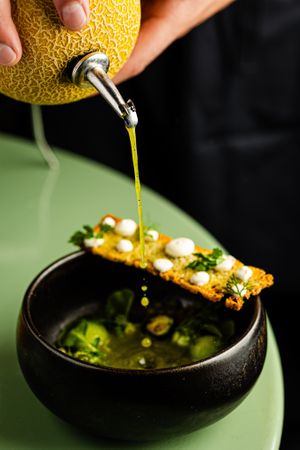 Our chilled cucumber soup, poured from a melon — for us, the experience is just as important as the taste at ANOAH in Zurich