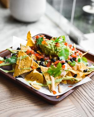 Nachos with gaucamole and vegan cheese at Plantiful - Plant-based Cafe in Bangkok