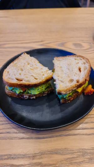 Grilled plant based cheese sandwich with Pesto on Sourdough at Plantiful - Plant-based Cafe in Bangkok