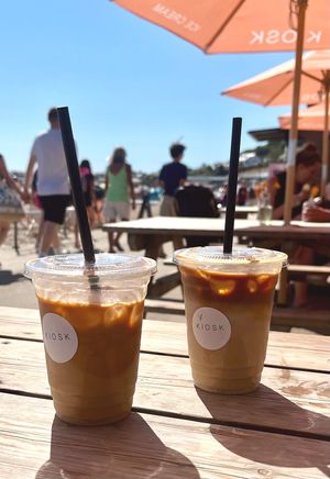 Iced Latte with Oat Milk, and a Iced Latte with Vanilla and Oat Milk. at Kiosk in Lyme Regis