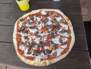 Pizza with house made oat cheese 🤤 at Liola Foods in Sedgefield