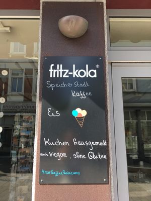 sign that says „vegan cake“  at The Lifestyle Cafe in Cuxhaven