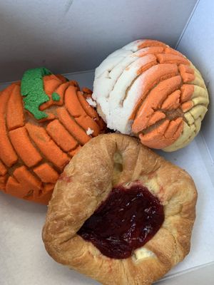 Halloween conchas & raspberry danish  at Toluca Bakery and Cafe in Los Angeles