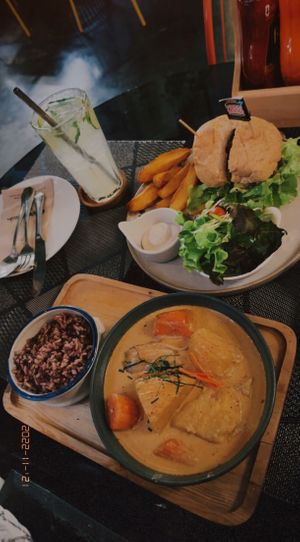 Lime soda (110 THB), Mushroom burger (255 THB), Massaman curry (180 THB)  at Goodsouls Kitchen in Bangkok