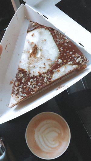Pear, almond and chocolate pie & chai latte  at Lucifer Lives in Brussels