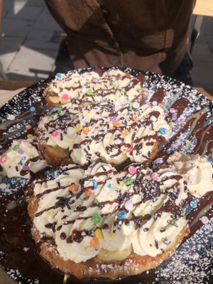 French Toast banana whipped cream and funfettis 👌  at Lucifer Lives in Brussels