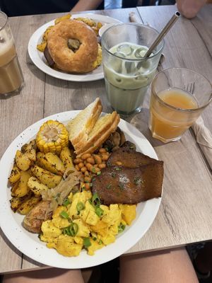 The full English breakfast with an iced matcha strawberry latte and apple juice  at Lucifer Lives in Brussels