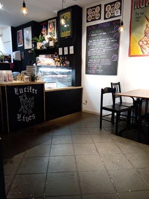 Counter and cake display at Lucifer Lives in Brussels