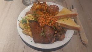 Vegan English breakfast with cheese toast at Lucifer Lives in Brussels