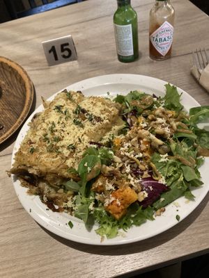 Fall lasagna with mushrooms, bechamel with dijon mustard, gondino cheese, salad with roasted butternut and walnuts  at Lucifer Lives in Brussels