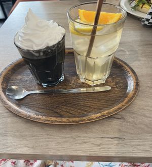 Black Metal (charcoal latte with a hint of vanilla) and homemade iced teaa  at Lucifer Lives in Brussels