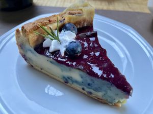 Cake flan pâtissier blueberry jam in take-away  at Lucifer Lives in Brussels