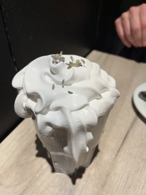 Lavender latte & whipped cream   at Lucifer Lives in Brussels