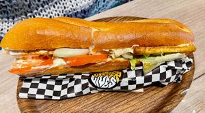 BLT (Bacon made with tofu, lettuce, mayo, tomato, red onions) € 8.5 (January 2026) at Lucifer Lives in Brussels