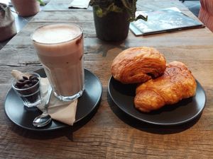 Hot chocolate, pain au chocolat and croissant from Succulente at Lucifer Lives in Brussels