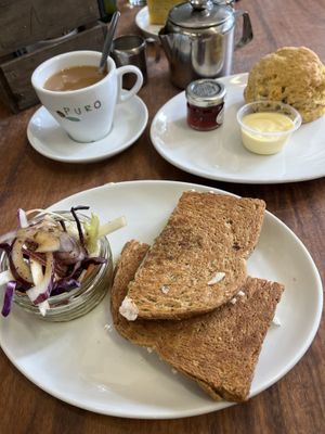 Mozzarella & pesto toastie, tea with oat milk & cream tea  at The Greenwood Tree in Lyndhurst