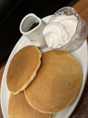 American pancakes with whipped cream and maple syrup   at The Greenwood Tree in Lyndhurst