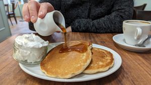 Vegan pancakes with maple syrup and whipped cream at The Greenwood Tree in Lyndhurst