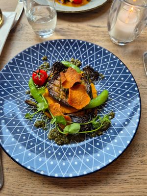 aubergine steak met zoete aardappel crème, chimichurri en gegrilde bimi at Bree33 in Leiden