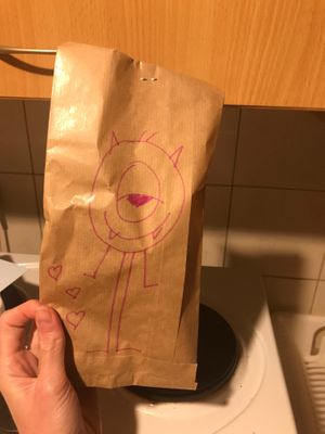 The bag the cones for carryout come in! at Cats & Monsters  in Athens