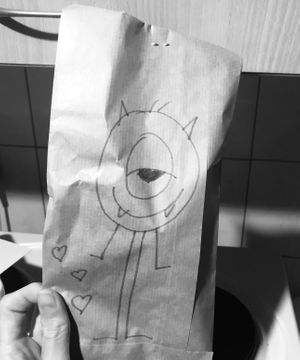 A monster drawn on the vegan ice cream cone delivery bag at Cats & Monsters  in Athens
