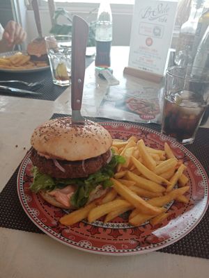 Vegan burger with fries at B-Side Cafe in Fuerteventura