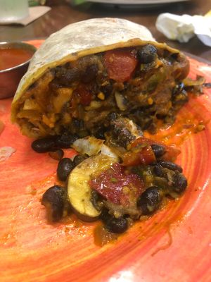 Got this burrito , already ate half but it’s delicious breakfast burrito. Lost of flavor the cheese is good, came with a side order of fruit . They had a great selections  at The Downtowner in Stockton