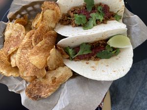 TVP “beef” Tacos, with cherry salsa, so good!  at Escape Velocity Brewing in Lafayette