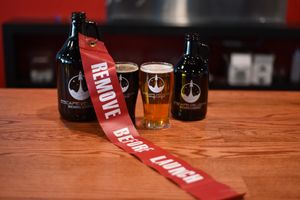 Growlers and pints of beer at Escape Velocity Brewing in Lafayette